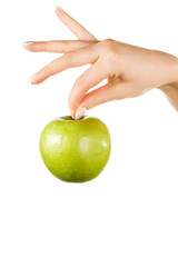Woman's hand holding an apple