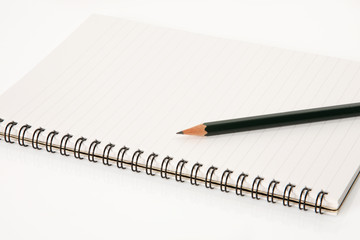 Notebook with pencil