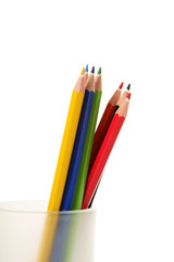 Naklejka premium Collection of colored pencils in a jar