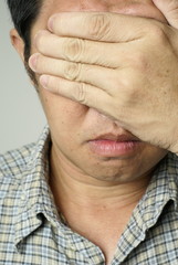 Fototapeta premium Asian man unhappy portrait