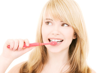 happy girl with toothbrush