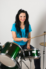 Fototapeta na wymiar Beauty woman drummer