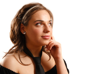 Beautiful young woman wearing black dress and tie