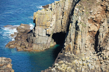 cave in cliff over the ocean