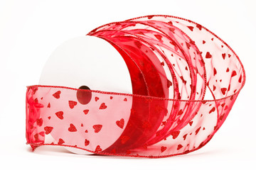 Spool of red heart ribbon