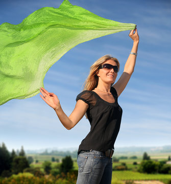 A Young Blond Woman With A Green Scarf