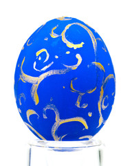 Eggs painted by hand in stand isolated on white background