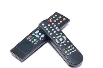 tv remote controls isolated on white