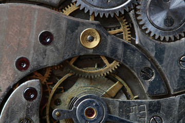 Close-up of old watch mechanism as background