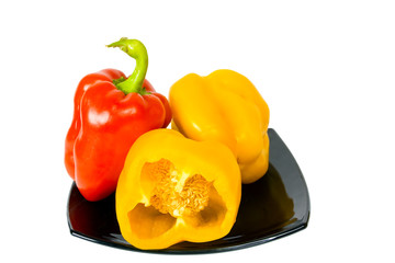 multicolored peppers in ceramic dish
