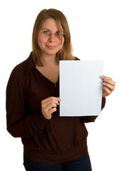 Fototapeta premium smiling women in glasses shows empty sheet