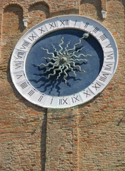 Ancient clock tower detail in Chioggia (Italy)