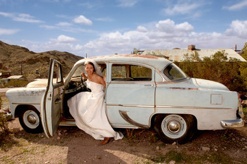 Beautiful Bride in a Rusted Out Car