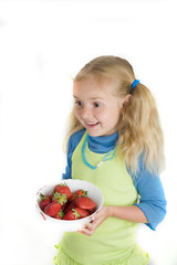 little girl with strawberries
