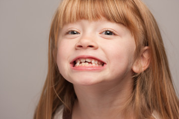 Portrait of an Adorable Red Haired Girl