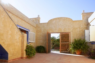 Naklejka premium Spanish golden mediterranean courtyard house