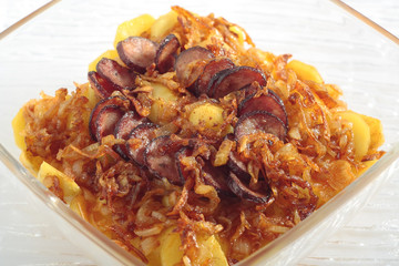 Roasted potatoes with onion and sausage