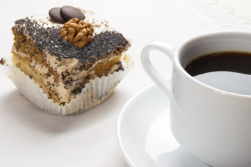 Close-up of a cup of coffee and pastry