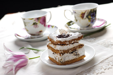 cake and cups of tea