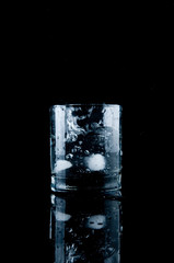 Glass of splashing water