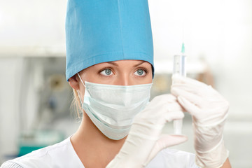 The doctor and a syringe