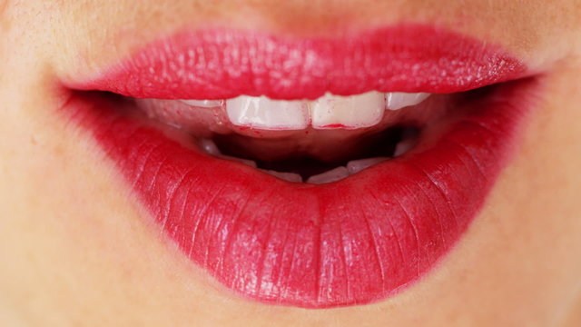 close up of beautiful woman's red lips