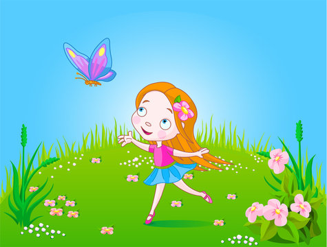 Little cute girl trying to catch an butterfly