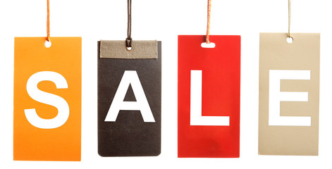 Sale written on paper tags isolated