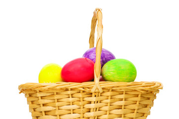 Easter concept with eggs and basket on white