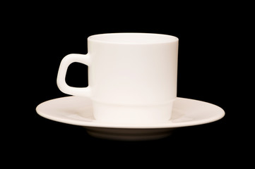 White cup isolated on the black background