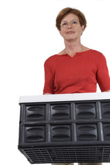 senior woman with fold box