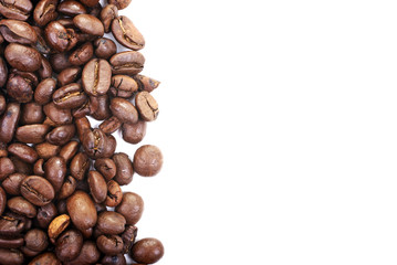 Dark coffee beans isolated on white background.