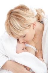 Obraz na płótnie Canvas Mother breast feeding her baby girl