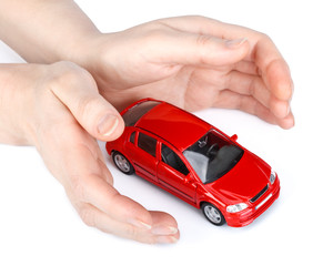 Red car in hands