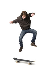 Boy jumping with a skateboard