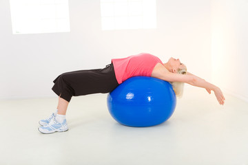 Exercising with fitness ball