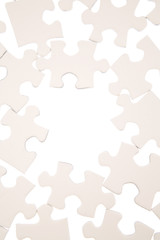 Jigsaw puzzle pieces over white