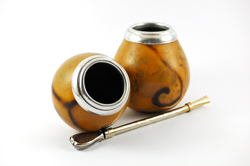 Two yerba mate gourds isolated on white