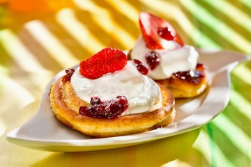 Pancakes on plate with strawberry
