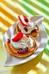 Pancakes on plate with strawberry
