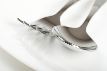 Photo of fork and spoon on plate