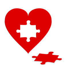 Jigsaw puzzle with red heart isolated on white background