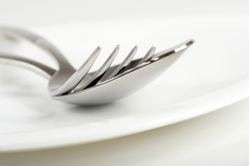 Photo of fork and spoon on plate