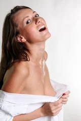 Wandaufkleber sexy Frau im nassen weißen Hemd © Andrey_Arkusha