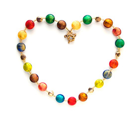 Colorful glass beads shaped as heart