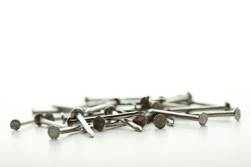 Nails on white background