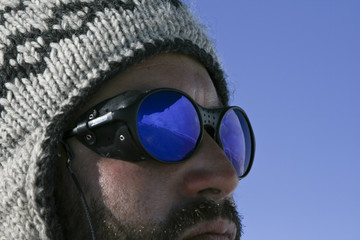 Reflection in the sunglasses of a mountaineer on Antarctica © Gentoo Multimedia