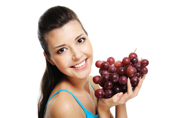 woman with bunch of grapes