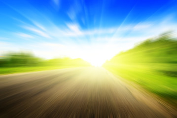 motion blur road and sun