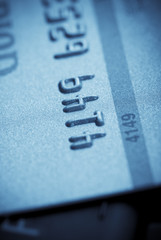 Macro close-up of credit card on laptop's keyboard